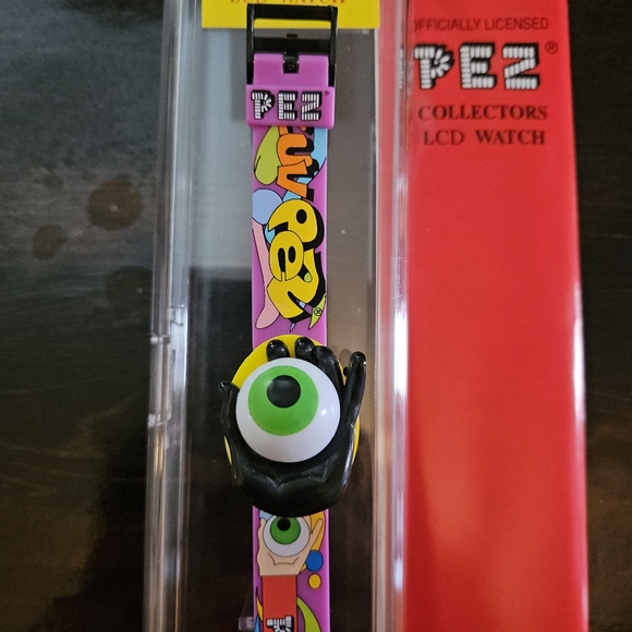 Pez Psychedelic Eye Collector's LCD Watch Black Hand Green Eye, working, new - Picture 2 of 4